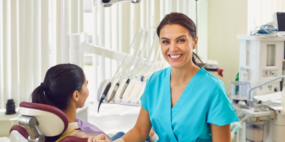 Smiling Dentist in Office Because SEO Brought In More Patients